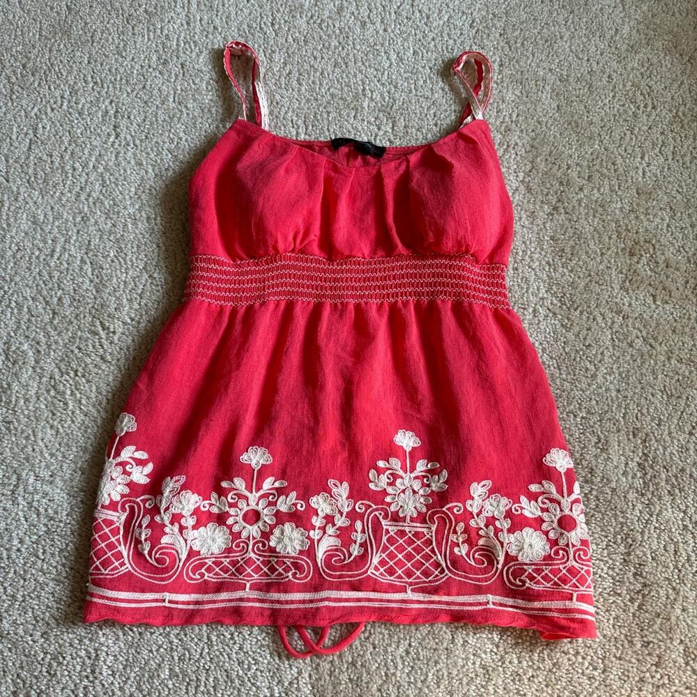 Pinkish red top with white flower embroidery and tie up back